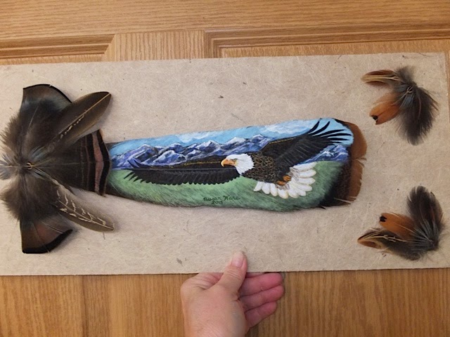 bald eagle painted on feather