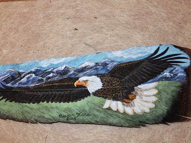 closeup of bald eagle painted on feather