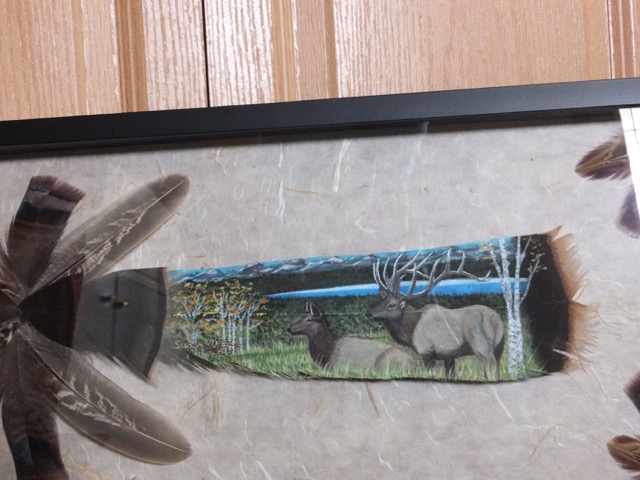 elk painted on feather